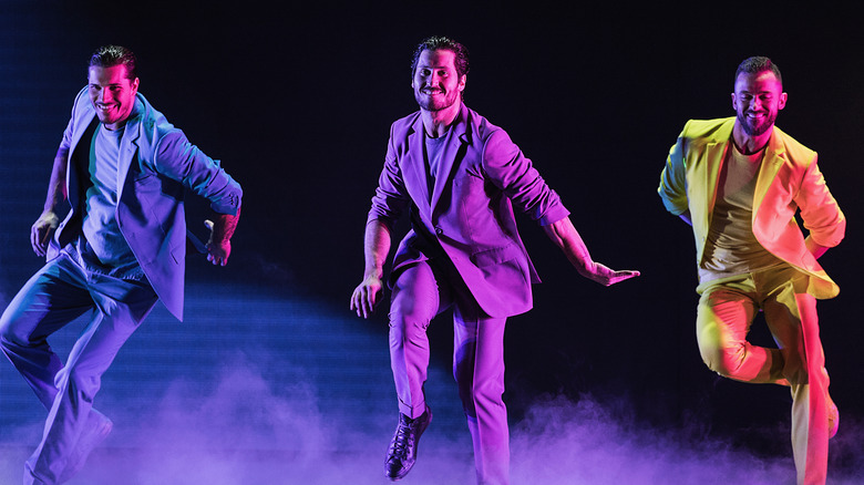 Gleb Savchenko dancing with Val Chmerkovskiy and Artem Chigvintsev