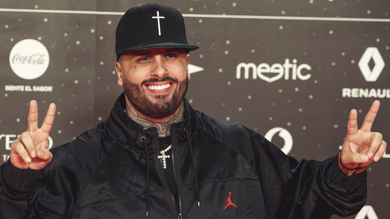 Nicky Jam giving the peace sign