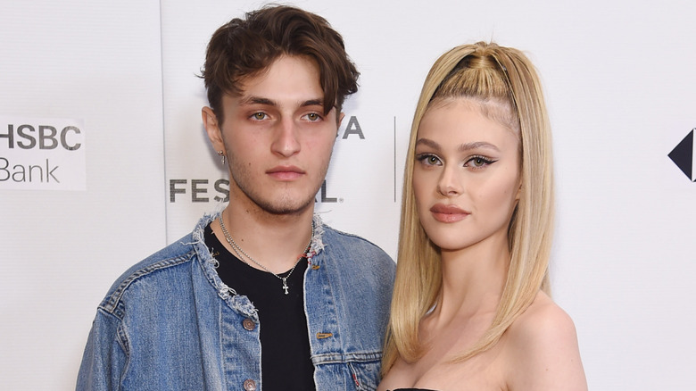 Anwar Hadid and Nicola Peltz pose in 2018