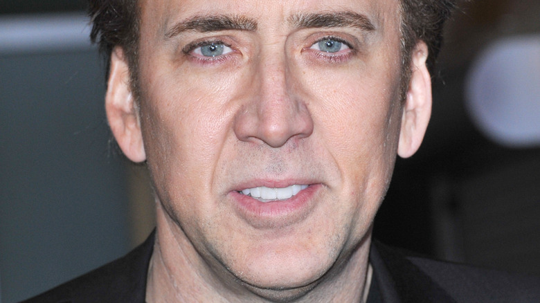 Nic Cage looks at the camera