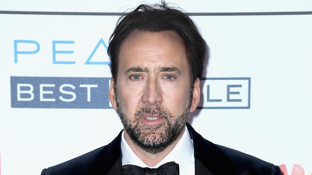 Nicolas Cage wearing a tuxedo on the red carpet