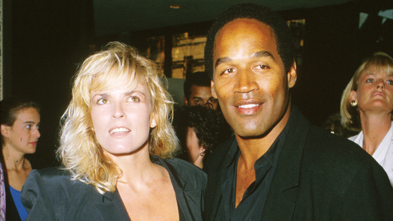 Nicole Brown Simpson gazing up, O.J. Simpson smiling