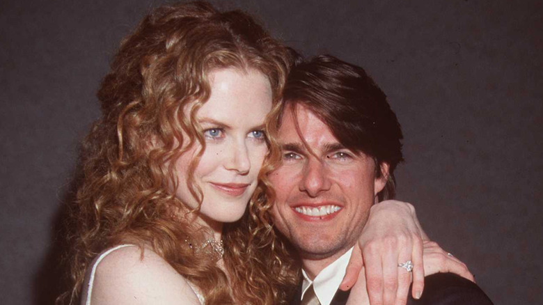 Nicole Kidman and Tom Cruise hug in 1998.
