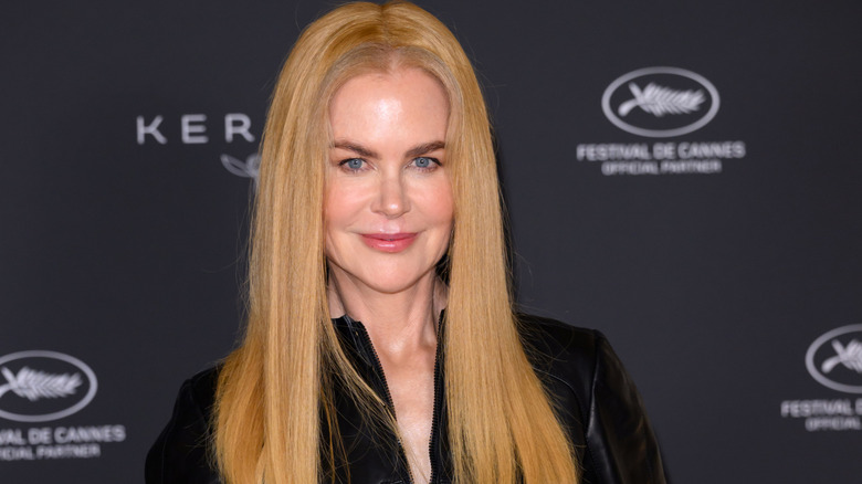 Nicole Kidman with straight blond hair at a Cannes event.