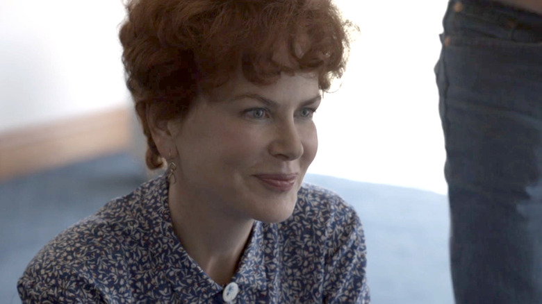 Nicole Kidman smiling in red wig