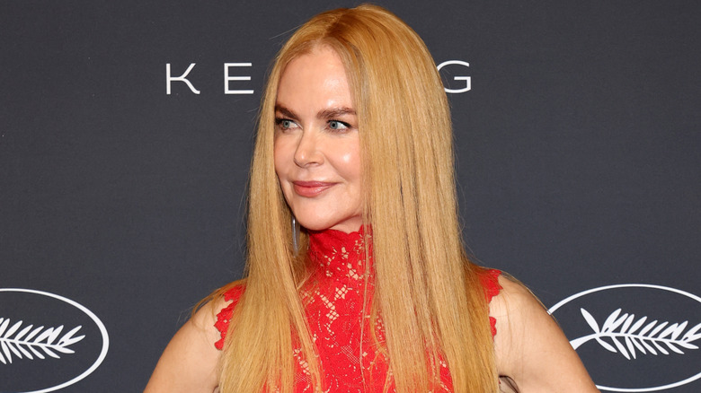 Nicole Kidman smiling and looking to the side at Cannes 2025