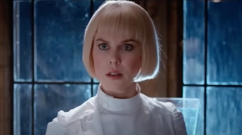 Nicole Kidman wearing a short, blond bob wig in Paddington