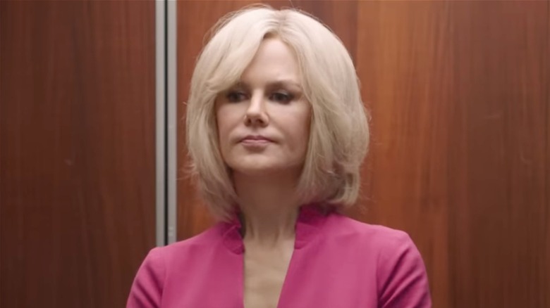 Nicole Kidman pursing her lips and looking up as Gretchen Carlson in Bombshell