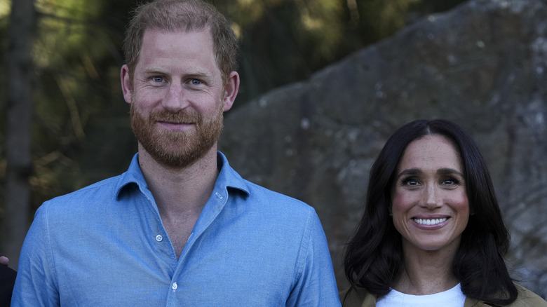 Prince Harry and Meghan Markle smiling