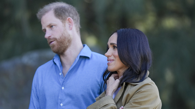 Prince Harry and Meghan Markle standing together