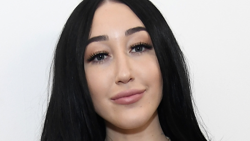 Noah Cyrus smiling