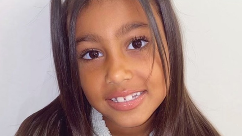 North West pink glitter eyeshadow missing tooth