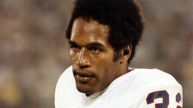 O.J. Simpson playing football