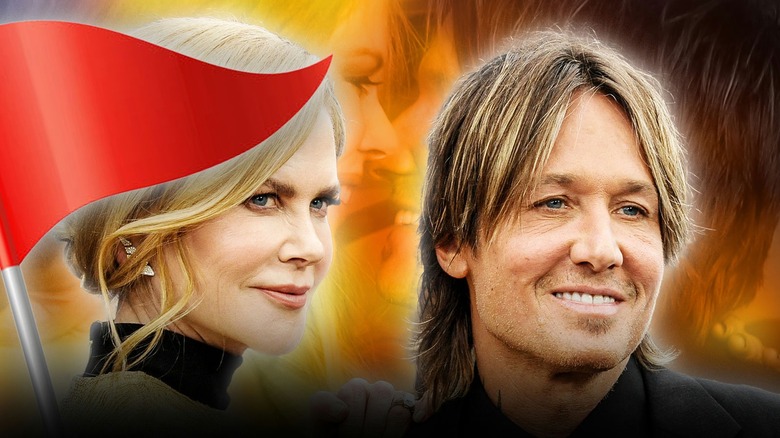 Nicole Kidman and Keith Urban with a red flag beside them