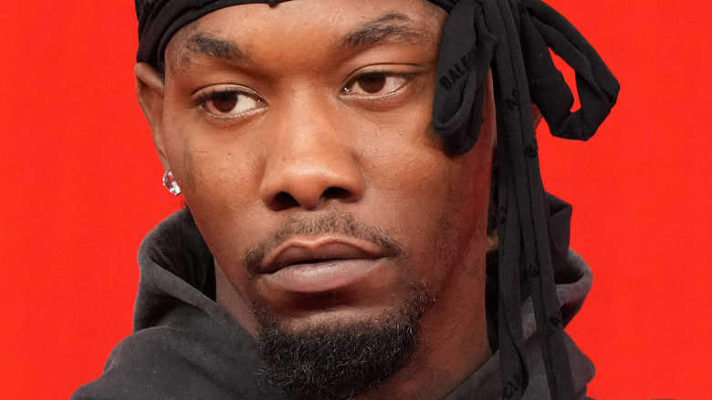 Offset staring to the left, with a red background