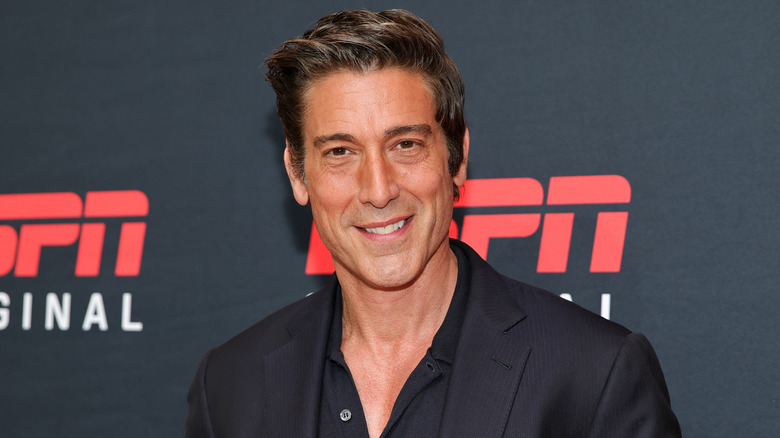David Muir smiling with teeth