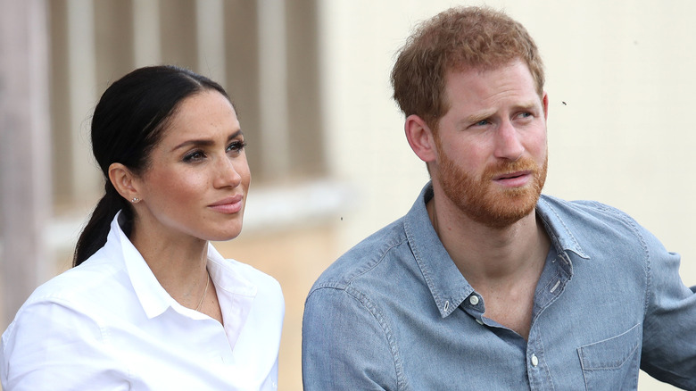 Harry and Meghan watching