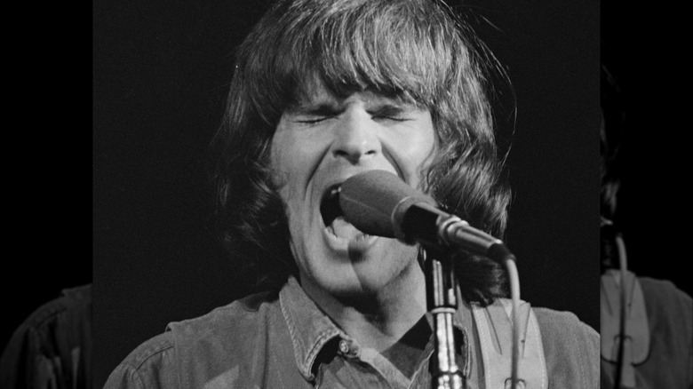 John Fogerty of CCR sings at Woodstock