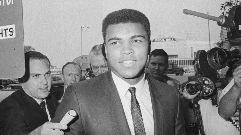 Muhammad Ali arrives for a court date in the 1960s