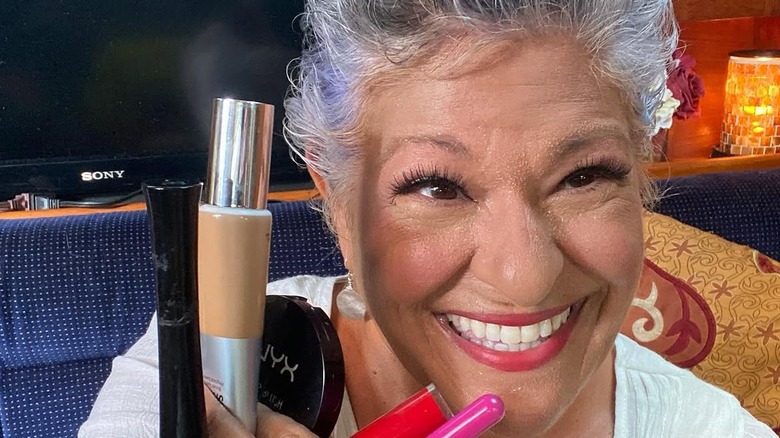 Antonella Nester posing with make-up collection