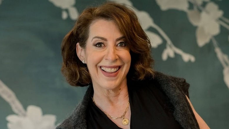 Donna Hoffman posing for cameras with a smile