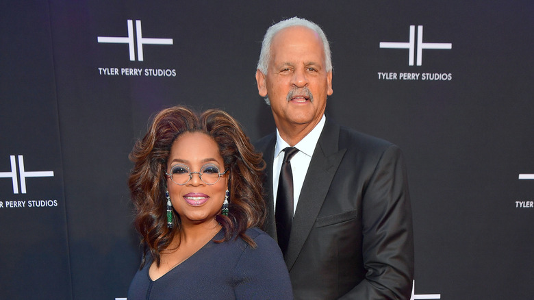 Oprah Winfrey and Stedman Graham posing together at an event