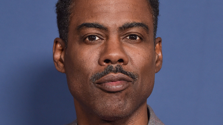 Chris Rock posing