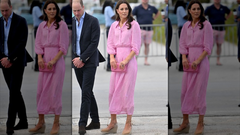 Kate Middleton wearing a pink dress and brown ratan wedge sandles