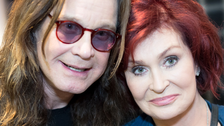 Ozzy Osbourne and Sharon Osbourne posing