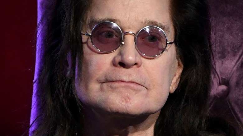 Ozzy Osbourne wearing tinted glasses