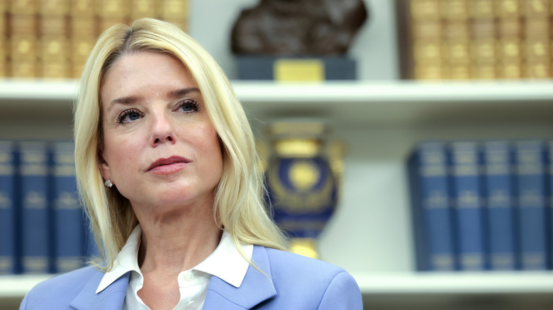 Pam Bondi looks at a point off camera in 2025