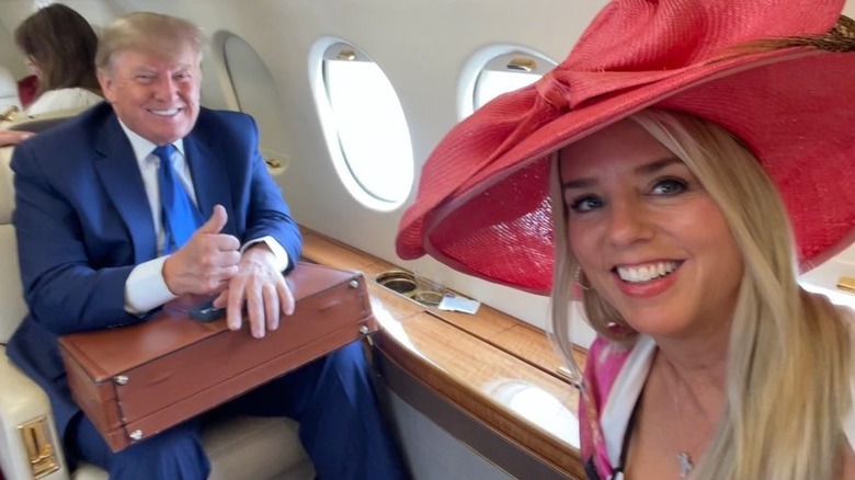 Pam Bondi and Donald Trump on a flight to the Kentucky Derby