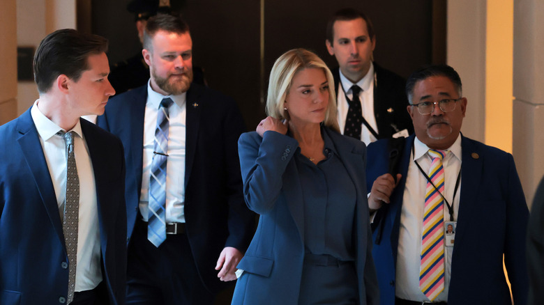 Pam Bondi pictured entering a meeting.