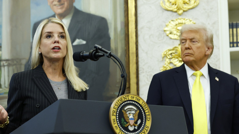 Donald Trump looking at Pam Bondi