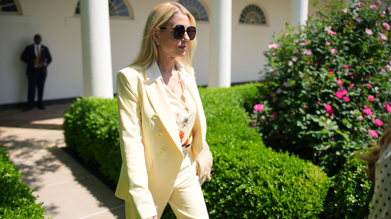 Pam Bondi walking through the White House gardens
