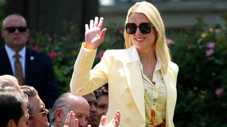 Pam Bondi waving