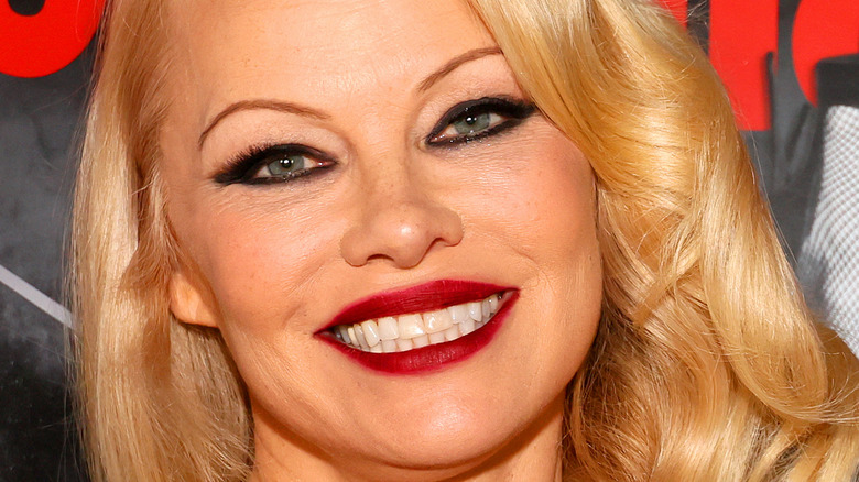 Pamela Anderson smiling for photo 