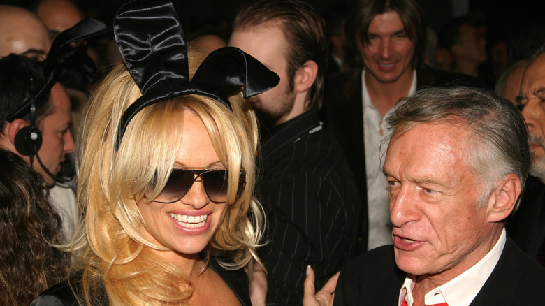 Pamela Anderson and Hugh Hefner at the Playboy 50th Anniversary party.