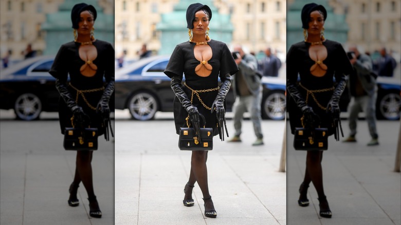 Kat Graham black and gold Schiaparelli dress