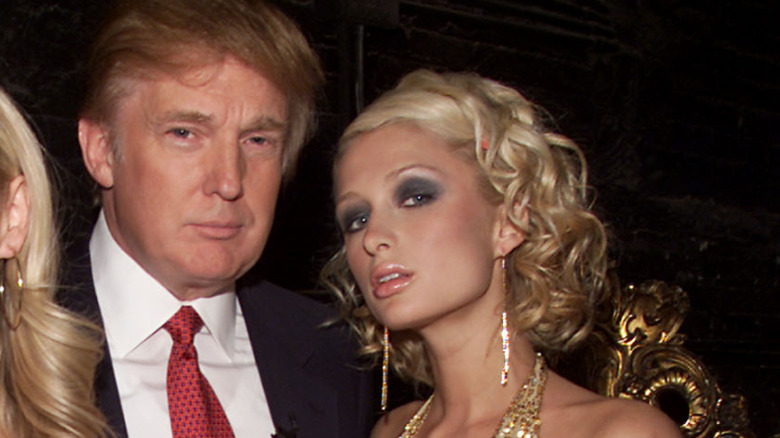 Donald Trump and Paris Hilton posing together.