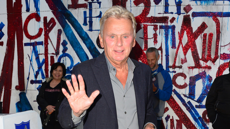 Pat Sajak waving