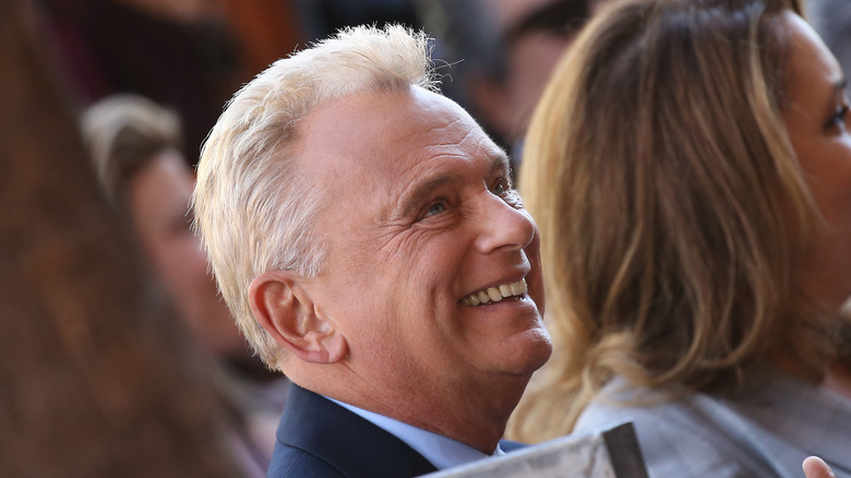 Pat Sajak smiling and looking ahead