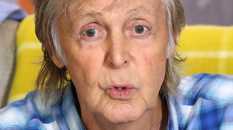 Paul McCartney speaking with serious expression