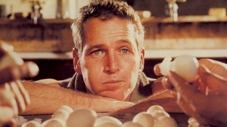 Paul Newman with his chin on his hand