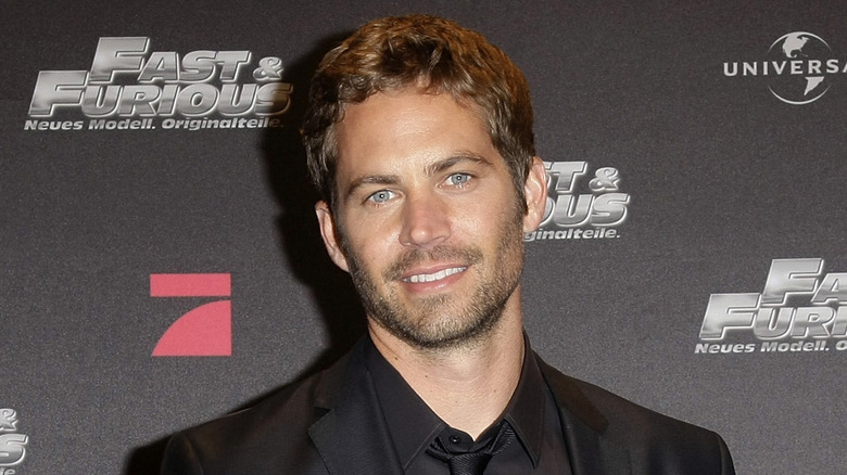 Paul Walker in black suit at premiere