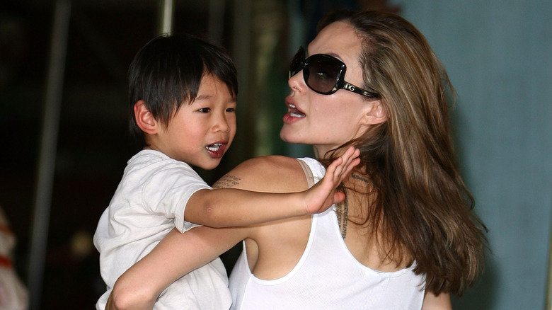 Angelina Jolie in the park with Pax in 2007