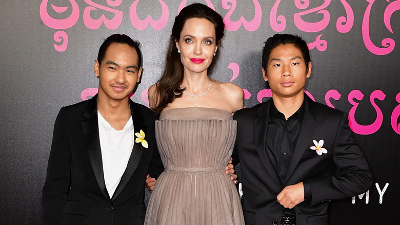 Angelina on a 2017 red carpet with Maddox and Pax