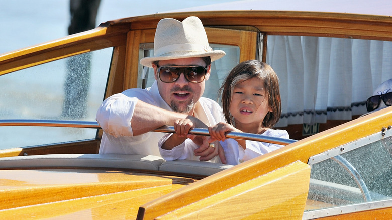 Brad Pitt and Pax on a boat in Venice in 2008