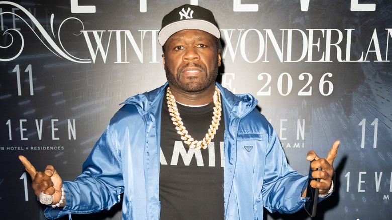 50 Cent poses on a 2025 red carpet.