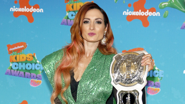 Becky Lynch holds her championship belt in 2023.